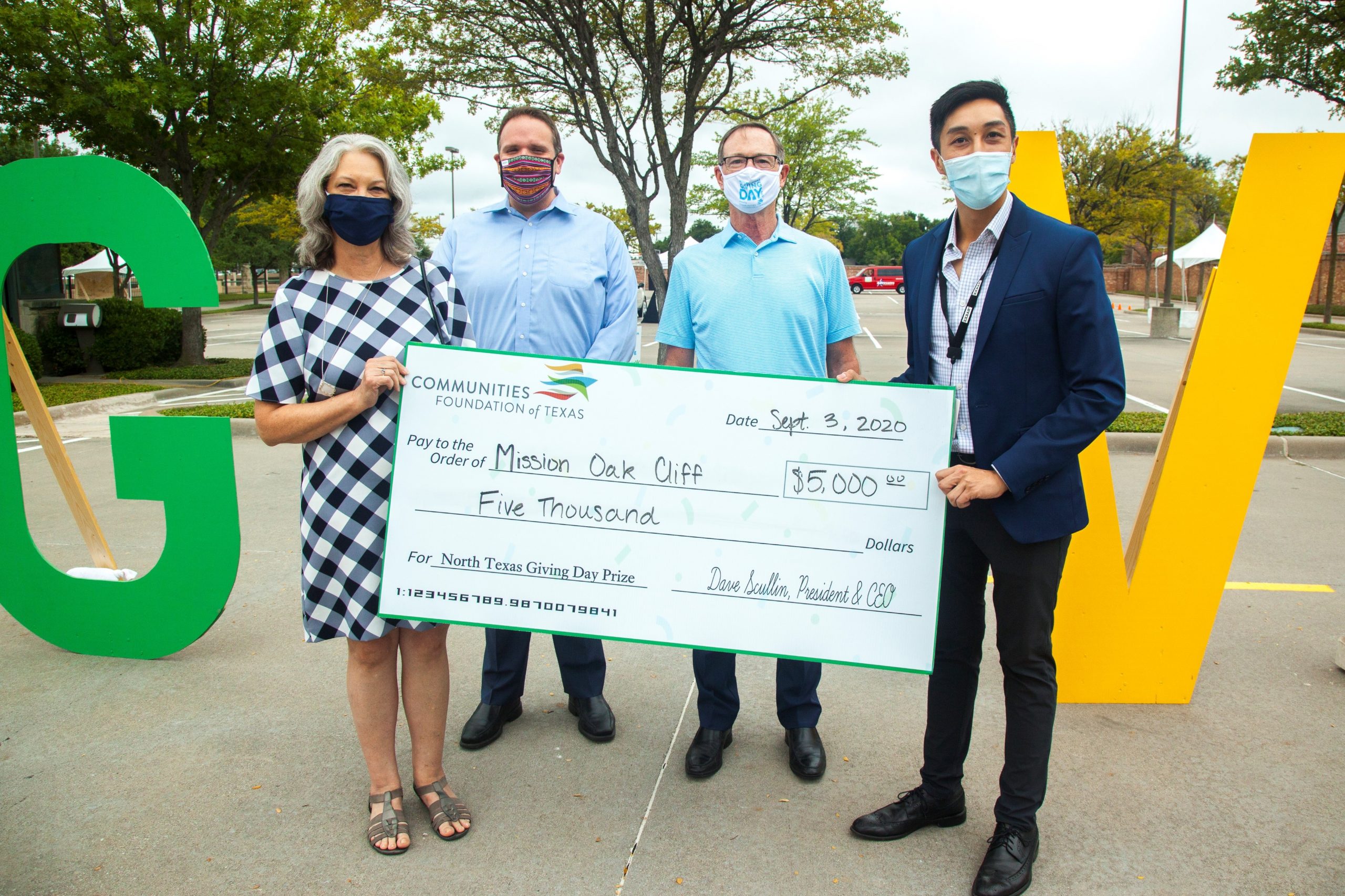 Matthew Randazzo and Dave Scullin present prize check